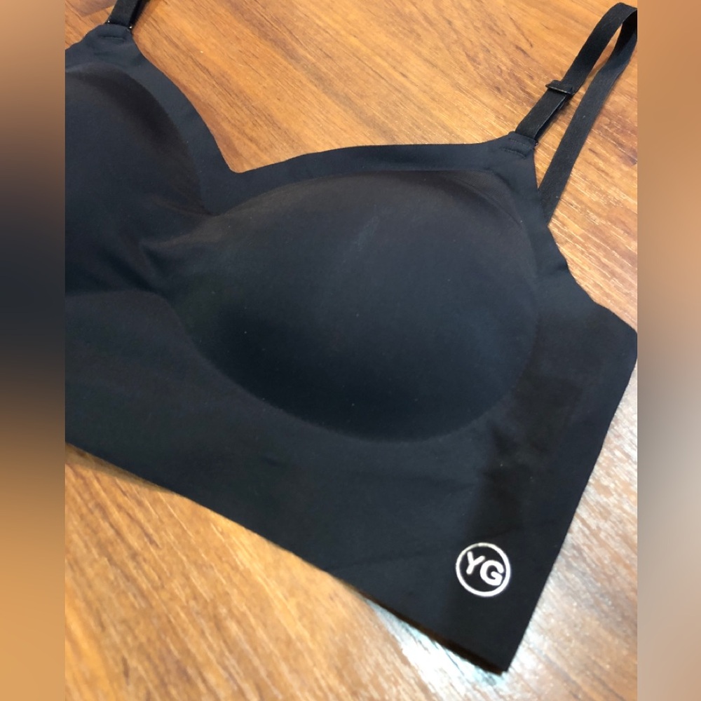 YG Bra. Size Large. (Fits more like a small/medium.) see measurements. Had pads.